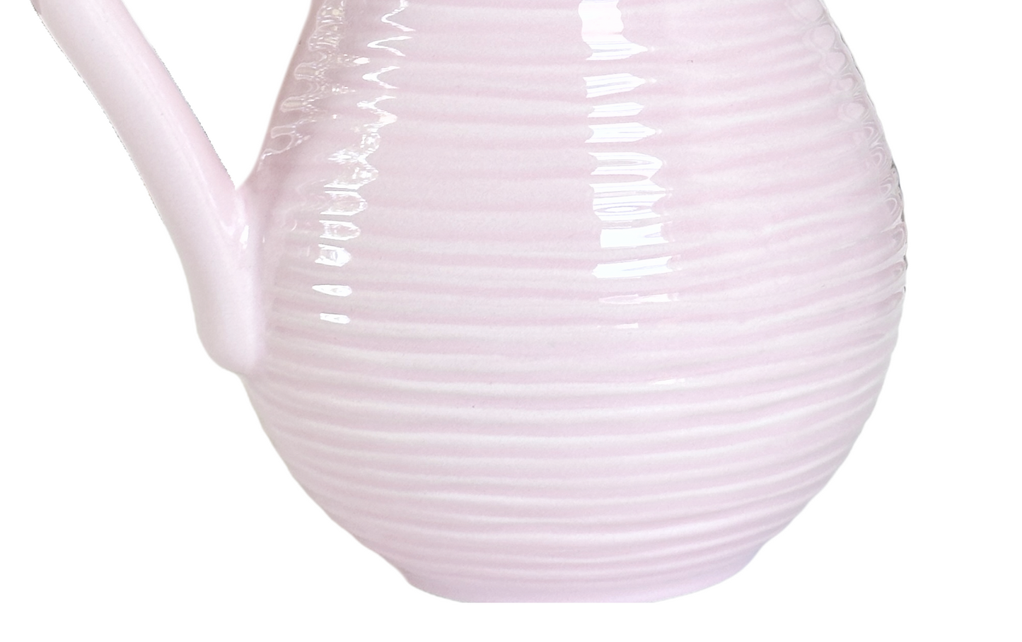 White ceramic pitcher with ribbed texture