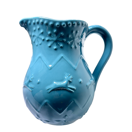 Blue ceramic pitcher with Christmas Reindeer decorative pattern