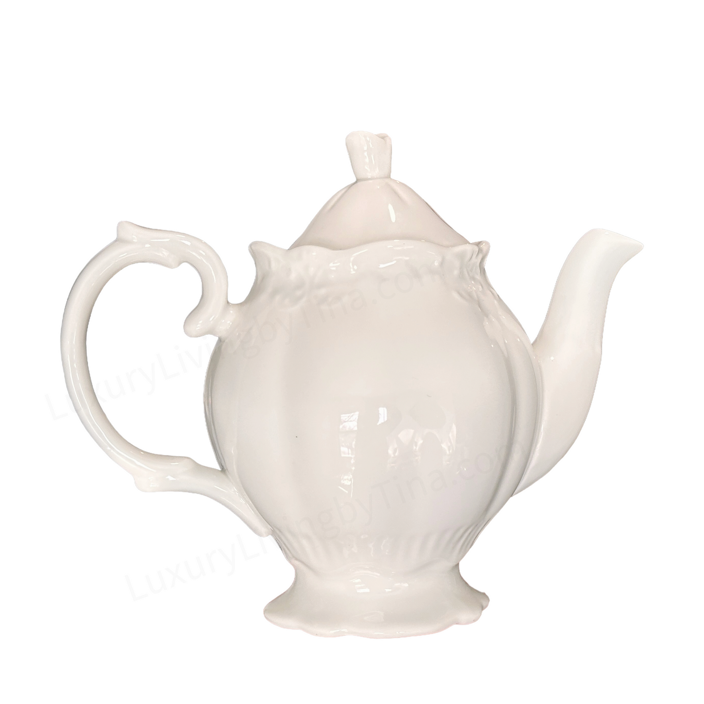 White Porcelain Tea Service with Curved Spout, Ornate Handle, And Domed Lid