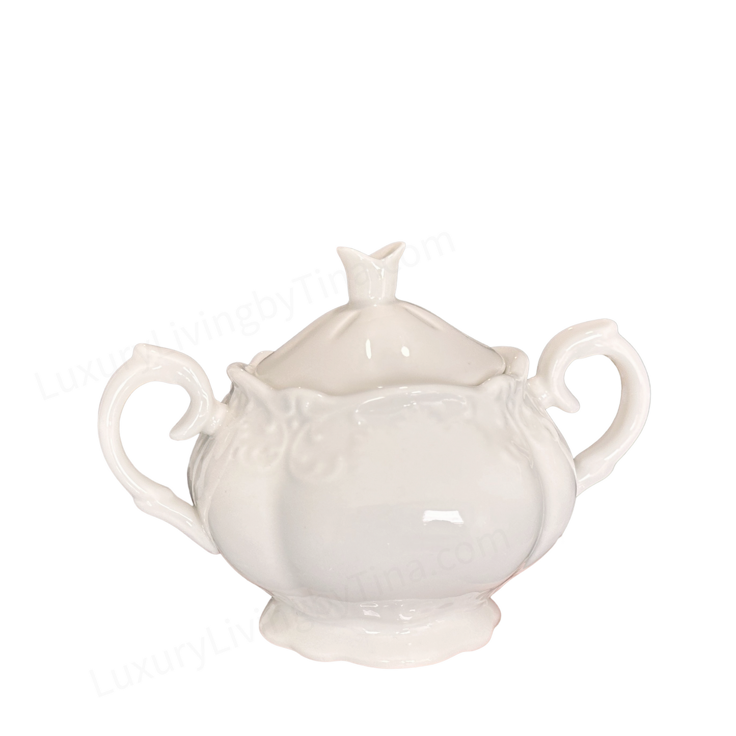 White Porcelain Tea Service with Curved Spout, Ornate Handle, And Domed Lid