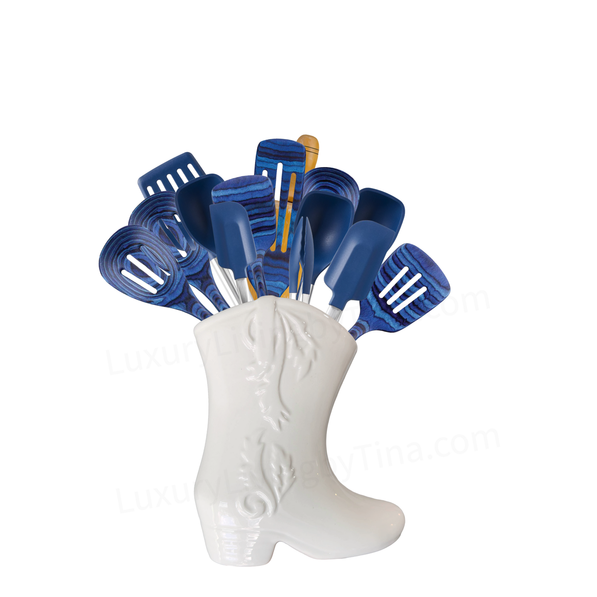 Set of blue kitchen utensils in a white boot-shaped holder 