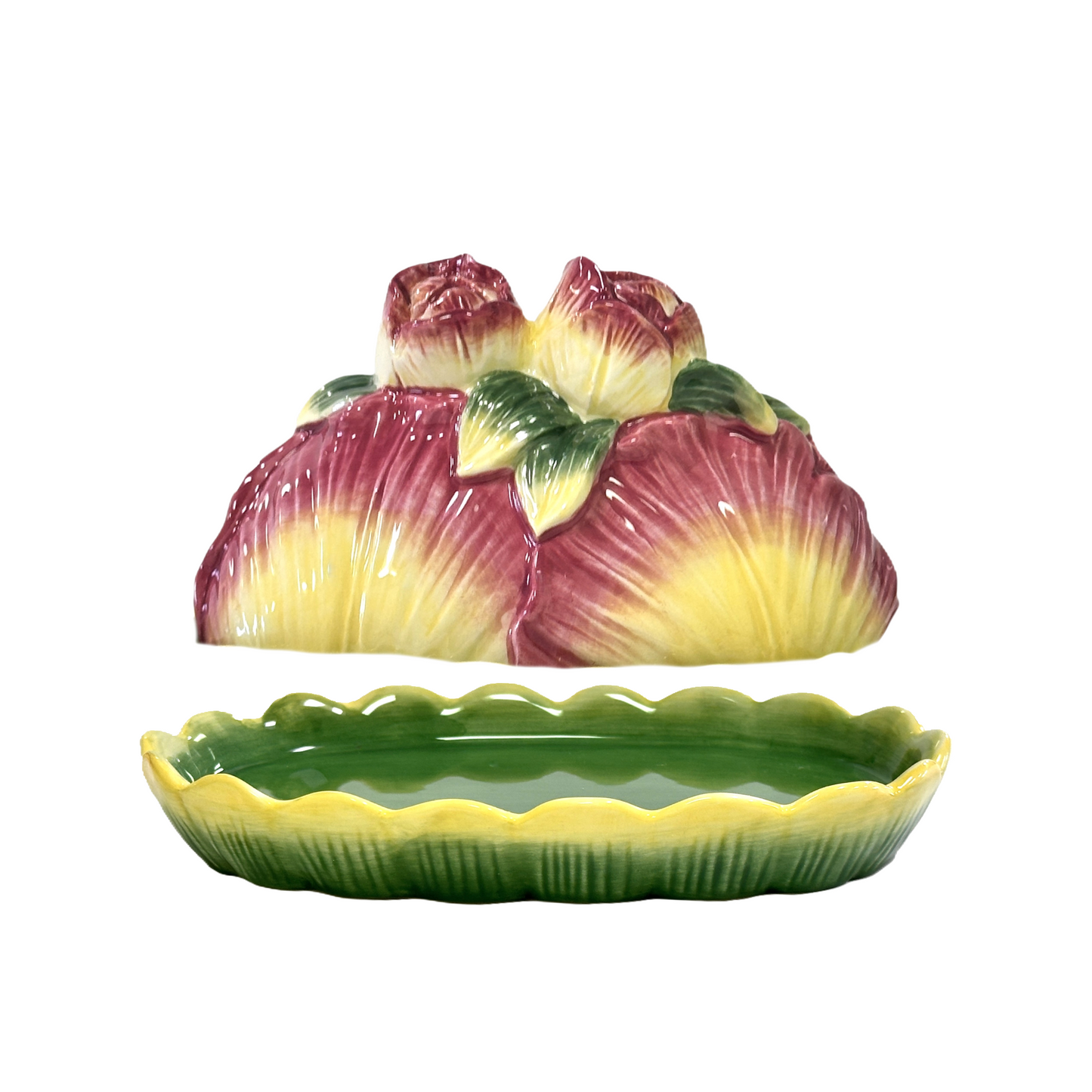 Ceramic fruit-shaped butter dish with pink and yellow roses and cabbage leaves on a lilypad base
